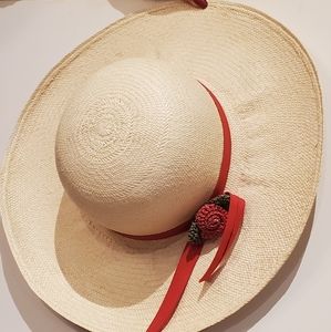 Hand woven straw hat woth matching rose